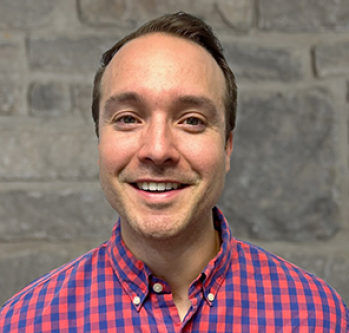 Man with brown hair, smiling