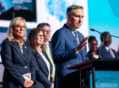 King County, Wash. Executive Dow Constantine discusses the final report of the NACo Commission on Mental Health and Wellbeing July 13 at the Opening General Session as his co-chair, Los Angeles County, Calif. Supervisor Kathryn Barger and other commission members look on. Photo by Denny Henry