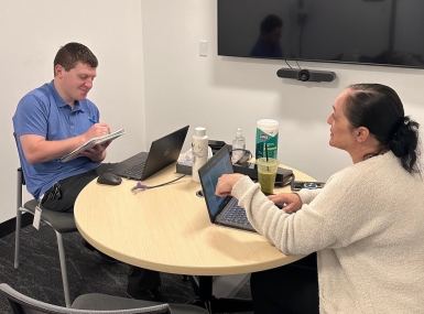 Bernalillo County, N.M. FLAME trainee Jayden Wheeler works with his job coach, Jennifer Bartholf. Photo courtesy of Cindy WeaselBear