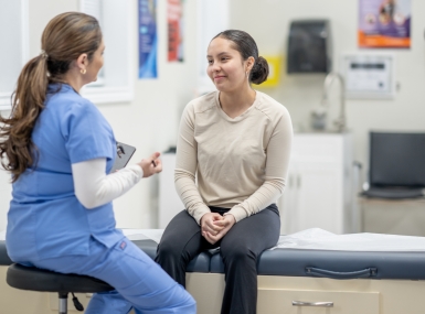 Doctor conducting exam on a teen