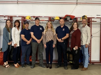 UAC leaders meet with Moab Valley Fire Protection District members. From left: Marki Rowley, Millard County clerk and UAC secretary; Shelley Brennan, Duchesne County recorder and UAC immediate past president; Carter Lloyd and Doran Michels, firefighters, Brandy Grace, UAC CEO; TJ Brewer, firefighter; Sheri Dearden, UAC COO and Bill Winfield, Grand County commissioner. Photo courtesy of Brandy Grace