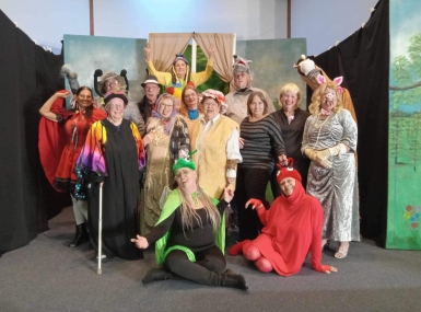 Members of the Saline County, Kan. Senior Center theater group pause for a photo in costume.