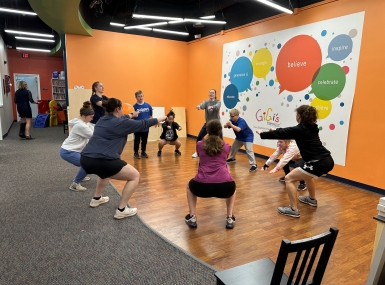 Allen County, Ind. residents with Down syndrome participate in a fitness program at GiGi’s Playhouse Fort Wayne. GiGi’s was one of 43 local organizations that received Health First Indiana funding from the county to address obesity in their population. Local physical and occupational therapy college students get them active several times per week and teach portion size and nutrition to families in the program. Photo courtesy of Allen County Public Health