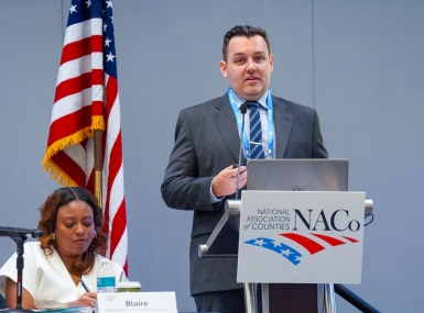  Stephen McCall, the director of research for PHI, discusses the role of Medicaid in home and community-based services March 1 before the Health Policy Steering Committee. Blaire Bryant, legislative director for Health Policy, sits to his right. Photo by Leon Lawrence III