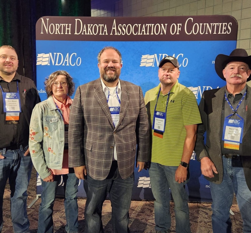 North Dakota Association of Counties (NDACo) President Jayme Tenneson (center), with colleagues on the association’s Board of Directors (l-r): Nick Moser, third vice president (Cavalier County), Trudy Ruland, first vice president (Mountrail County), Tenneson, Chad Kaiser, second vice president (Stutsman county) and Steve Lee, past president (McLean County). Photo courtesy of NDACo