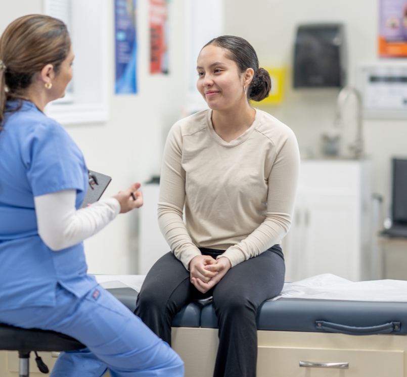 Doctor conducting exam on a teen