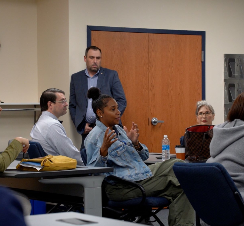 Venango County, Pa. Commissioner Chip Abamovic looks on as Cedric Group’s Meredith Whitehead discusses identifying partnerships in rural counties that have helped business owners recruit and retain skilled workers. Photo by Devin Zagar