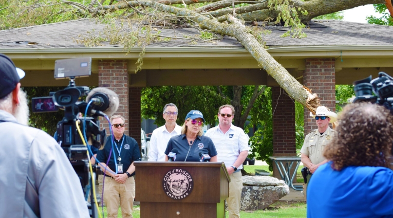 FEMA Administrator Deanne Criswell answers questions about storm recovery efforts at a press conference May 29 in Benton County, Ark. She was joined by local officials, including Benton County Judge Barry Moehring at left. Photo by Antoinette Grajeda/Arkansas Advocate