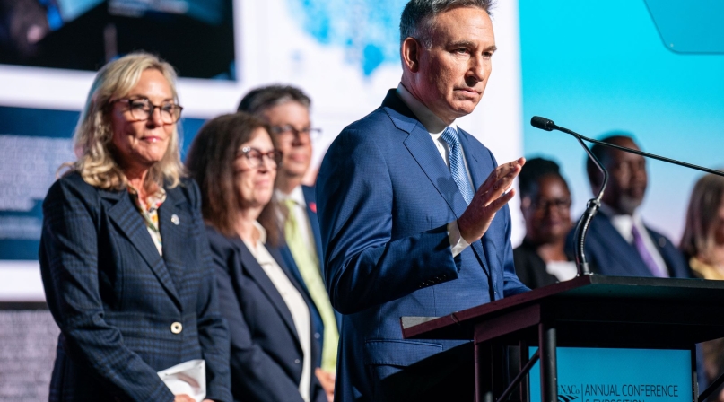 King County, Wash. Executive Dow Constantine discusses the final report of the NACo Commission on Mental Health and Wellbeing July 13 at the Opening General Session as his co-chair, Los Angeles County, Calif. Supervisor Kathryn Barger and other commission members look on. Photo by Denny Henry