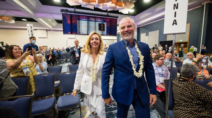 Gore and wife Elizabeth walk to the stage after he was elected NACo 2nd VP in 2022. Photo by Denny Henry