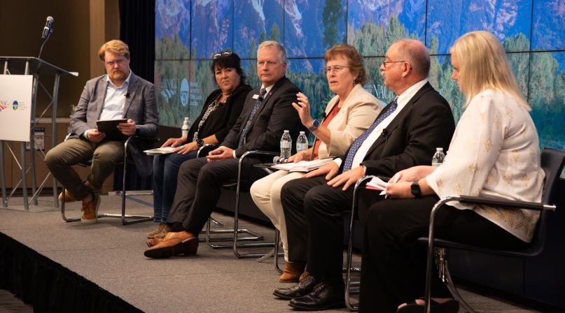 Intermountain Regional Forester Mary Farnsworth, third from right, describes the range of agreements that shared stewardship represents, during the inaugural Intergovernmental Forum on Public Lands Sept. 13 in Washington, D.C. From left: Idaho Association of Counties Executive Director Seth Grigg; Beaver County, Utah Commissioner Tammy Pearson; Idaho County, Idaho Commissioner Skip Brandt; Farnsworth; Stevens County, Wash. Commissioner Wes McCart and Jamie Barnes, Utah state forester. Photo by Chris Wathen