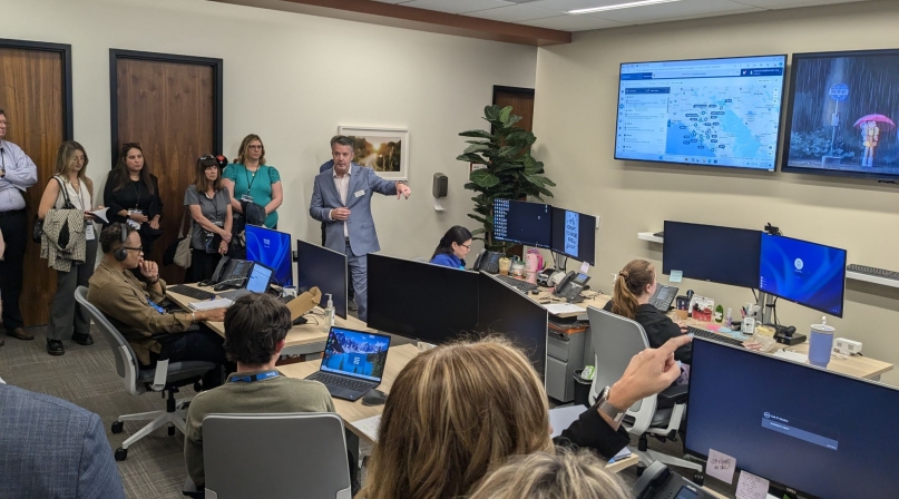 Members and partners of NACo's Familiar Faces Initiative Leadership Network observe the OC Be Well dispatch center in action in Orange County, Calif.