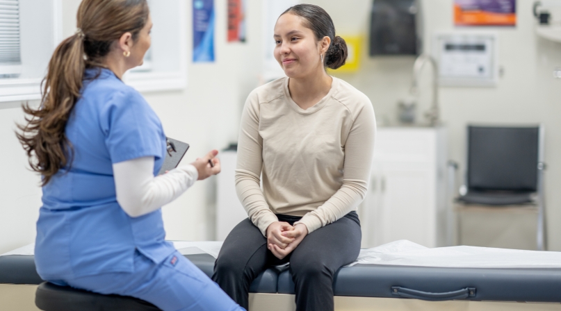 Doctor conducting exam on a teen