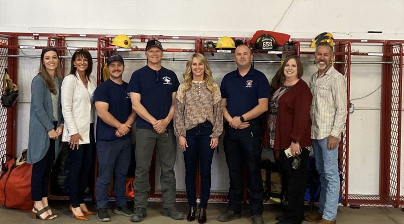 UAC leaders meet with Moab Valley Fire Protection District members. From left: Marki Rowley, Millard County clerk and UAC secretary; Shelley Brennan, Duchesne County recorder and UAC immediate past president; Carter Lloyd and Doran Michels, firefighters, Brandy Grace, UAC CEO; TJ Brewer, firefighter; Sheri Dearden, UAC COO and Bill Winfield, Grand County commissioner. Photo courtesy of Brandy Grace