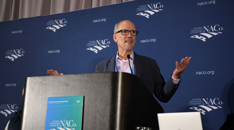 Tom Perez, the White House's emissary to county governments over the past year and a half, bids farewell to the NACo Board of Directors Dec. 6. Photo by Lana Farfan