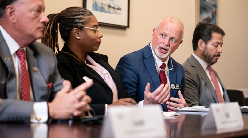 Faulker County, Ark. Judge Allen Dodson (second from right) argues that federal oversight and funding are necessary for supporting county governments before, during and after disasters. Charlotte County, Fla. Commissioner Bill Truex and Telfair County, Ga. Commissioner Dakkia Bradshaw are to his right and Harris County, Texas Commissioner Adrian Garcia is to his left. Photo by Denny Henry