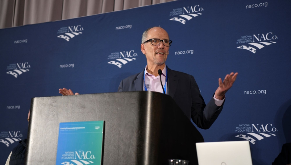 Tom Perez, the White House's emissary to county governments over the past year and a half, bids farewell to the NACo Board of Directors Dec. 6. Photo by Lana Farfan