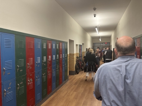 BRECC Coalition members make their way down the hall of the Fayette County school to housing project. 