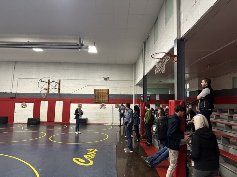 Greenbrier County Commissioner Tammy Tincher discusses the conversion process of the old school gym to a new gym for a local wrestling youth club.