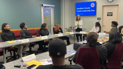 Hamilton County, Ohio high school government students hear a presentation on county government from County Commissioners Reece and Driehaus.