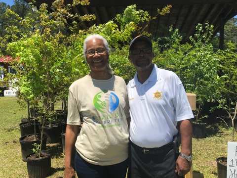 Residents participate in outdoor festivities during a county-wide NCGM and Earth Day celebration at a community park in Mobile County, Ala.